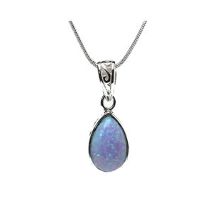 Mid Blue Teardrop Pendant In Gilson Opal And Sterling Silver Filigree Design On An 18" Sterling Silver Snake Chain.